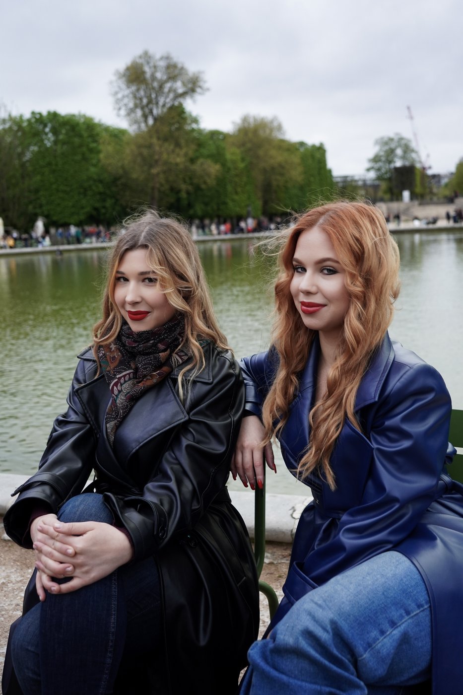 Two friends sitting by a fountain in the Tuileries Garden, Paris